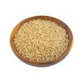 Wooden bowl filled with uncooked brown basmati rice on a white background