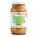 Jar of Forty Thieves crunchy almond butter on a white background