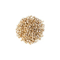 Pile of quinoa puffs on a white background