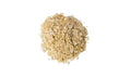 A pile of Organic Savoury Yeast Flakes on a white background