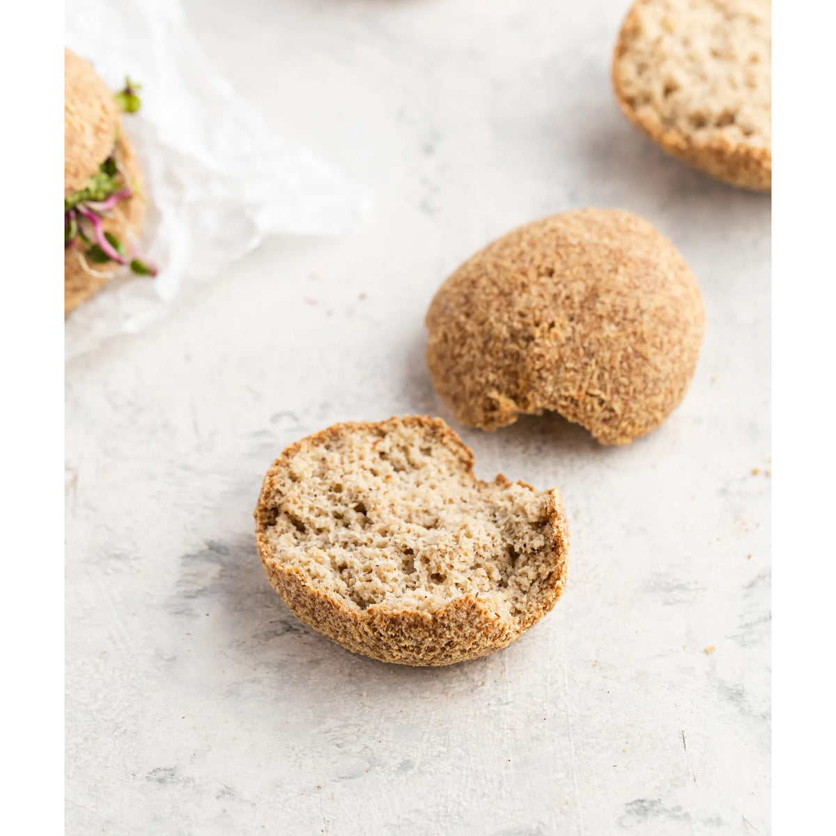 bread rolls on a marble surface
