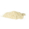 Heap of light-colored powder on a white background