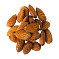 Pile of almonds on a white background