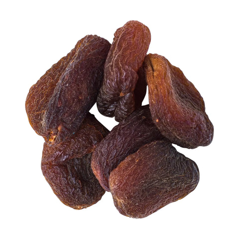 Organic dried apricots, rich orange colour, shown in a pile