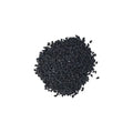 a small pile of black sesame seeds on a white background