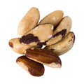 Brazil Nuts with a dark brown spot on a white background