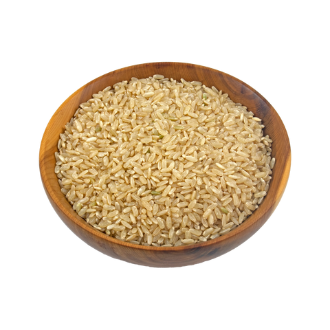 Wooden bowl filled with uncooked brown basmati rice on a white background