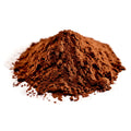 Pile of cocoa powder on a white background