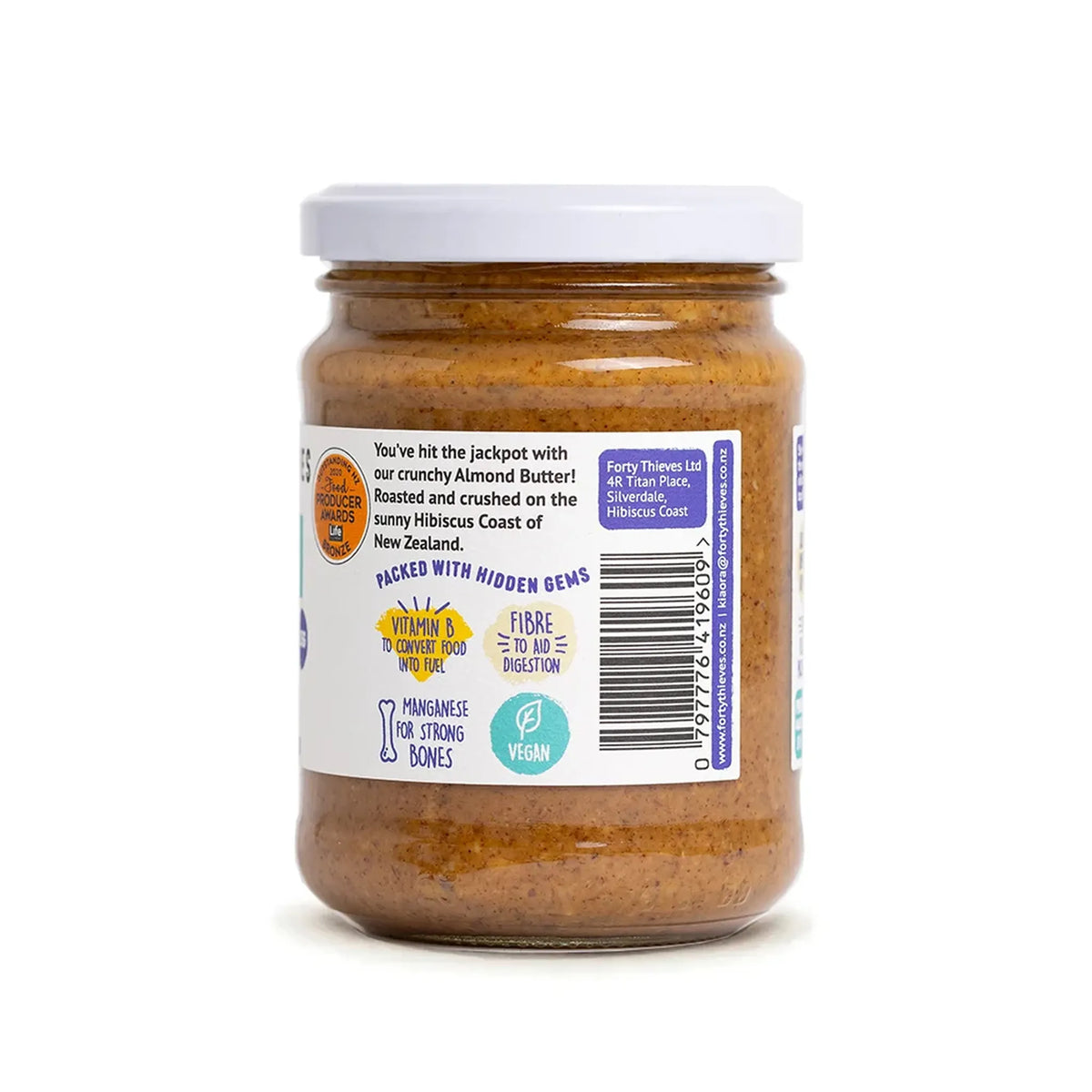 Jar of almond butter with a label on a white background