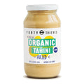 Jar of Forty Thieves Organic Tahini on a white background