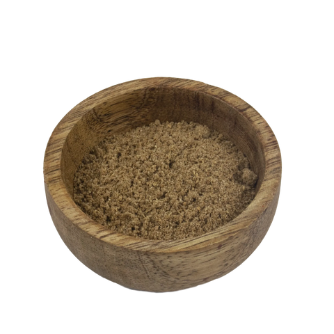 a small wooden bowl with coriander with white background
