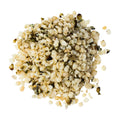 a pile of hemp seeds on a white background