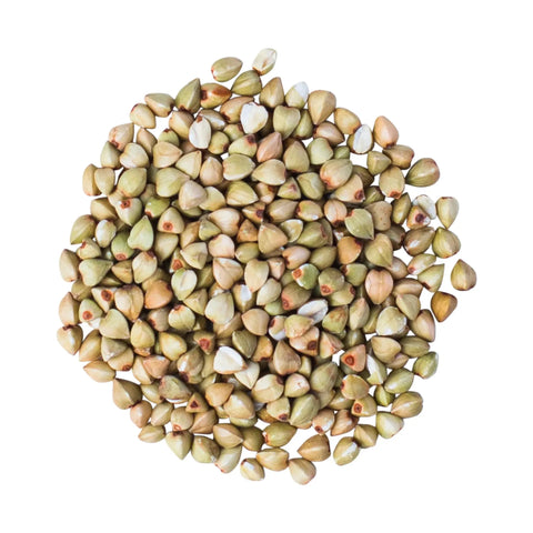 a pile of buckwheat groats on a white background