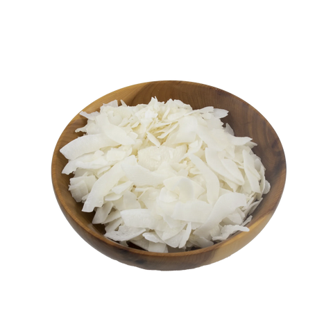 Wooden bowl filled with white shredded coconut on a white background
