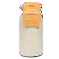 Container of premium vanilla whey protein powder with a yellow label on a white background