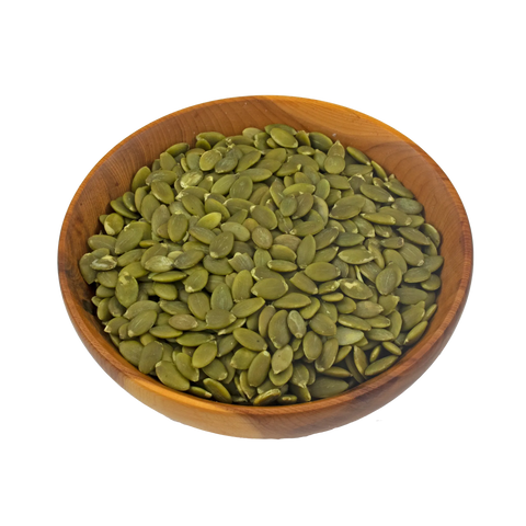 a small wooden bowl with pumpkin seeds on a white background