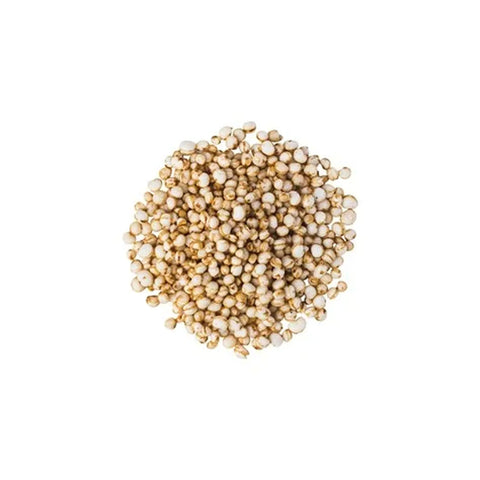 Pile of quinoa puffs on a white background
