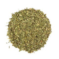 A pile of spearmint tea on a white background