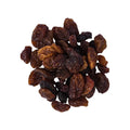 Pile of sultanas on a white background