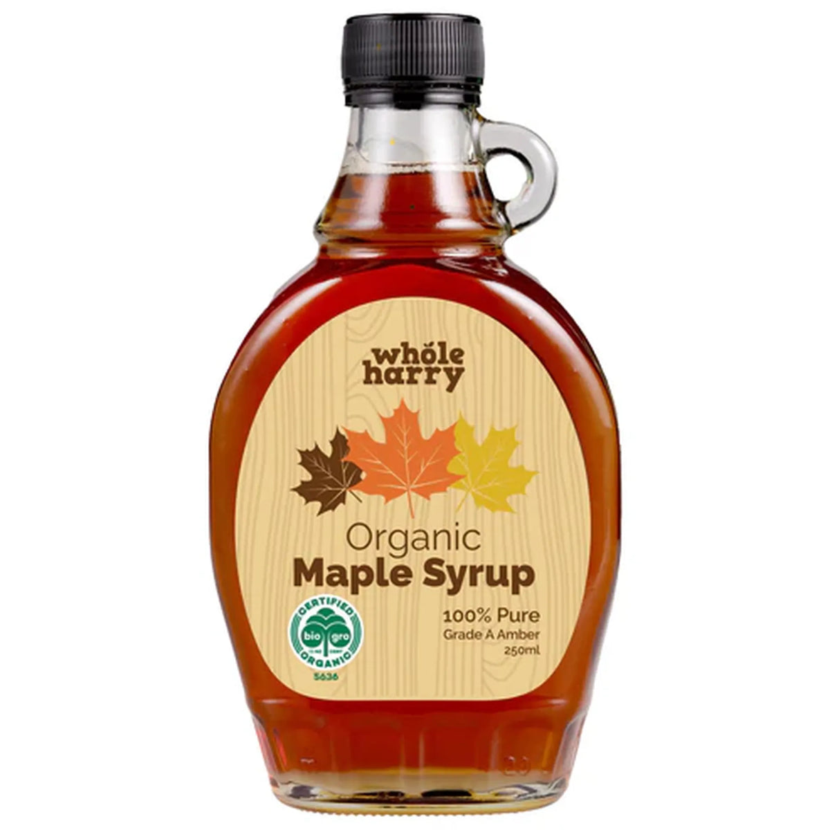 Bottle of Whole Harry Organic Maple Syrup on a white background