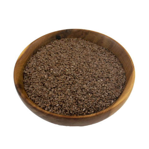 Wooden bowl filled with flaxseeds on a white background