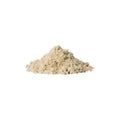 A pile of sunflower seed flour on a white background